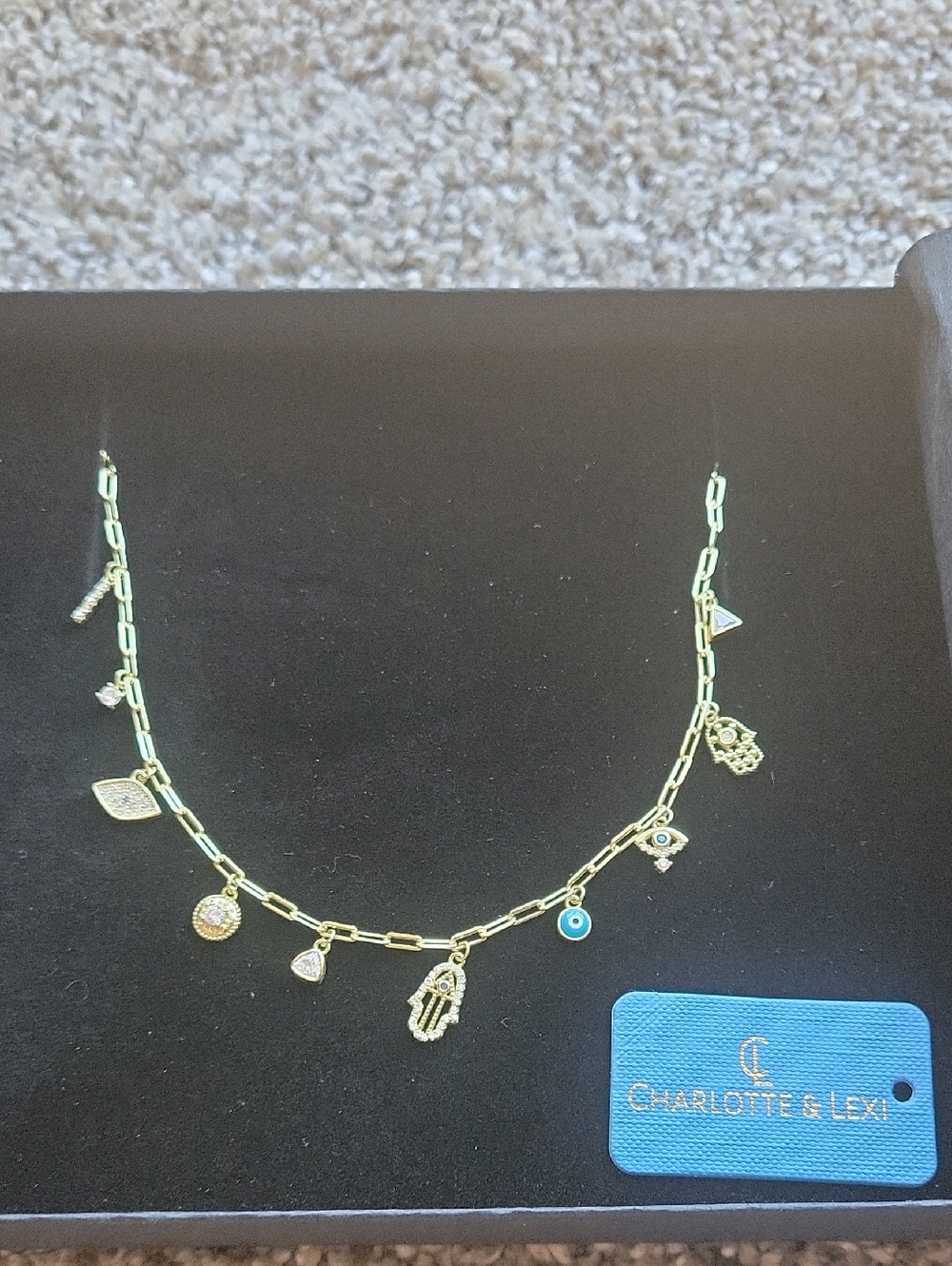 Charlotte & Lexi Gold Hamsa and Charm Necklace with Blue Eye Accent